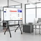 JAV Heavy Duty Rolling TV Stand in a modern office. This black mobile stand features lockable wheels, a shelf, and is shown supporting a large display screen with an application dashboard. Ideal for office presentations, meetings, and interactive workspaces.