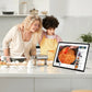 Image of a mother and her son learning to make spaghetti by watching a video on the JAV 25S Pro smart digital calendar.