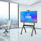 JAV H10S Pro interactive display positioned on a mobile rolling stand within a bright, modern high-rise office setting.
