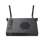 JAV SA12 Android 13 OPS module for Smart Board, top-angle view showing casing, ventilation holes, and WiFi antennas.