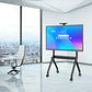 JAV H10S Pro interactive whiteboard positioned on a mobile rolling stand within a bright, modern high-rise office setting.